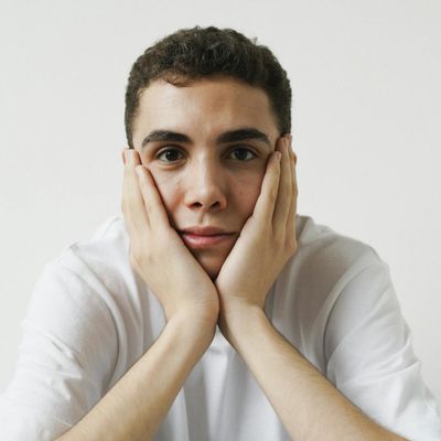 A calm, focused gaze of a person practicing.