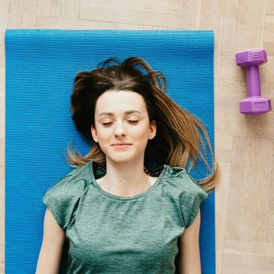 An empty, serene yoga mat in a quiet room.